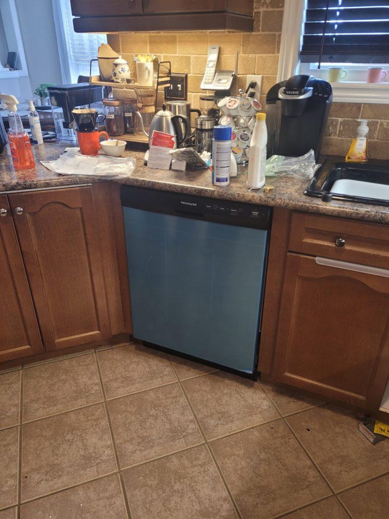 Built-in dishwasher in a kitchen, serviced by Octopus Royal