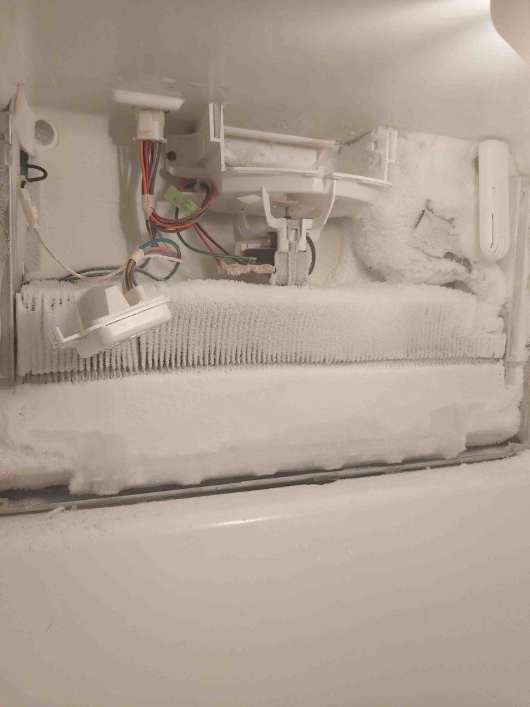 Frost build-up inside a freezer before a fridge repair by Octopus Royal