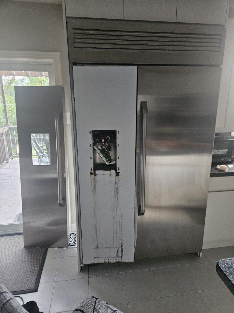 Stainless steel refrigerator serviced by Octopus Royal