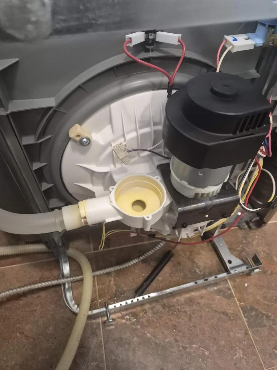 Frigidaire dishwasher with the failed drain pump removed
