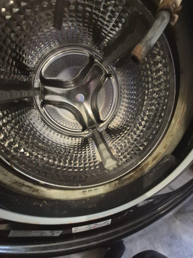 Samsung washer drum opening with the old door gasket removed, showing mould and grime, North York