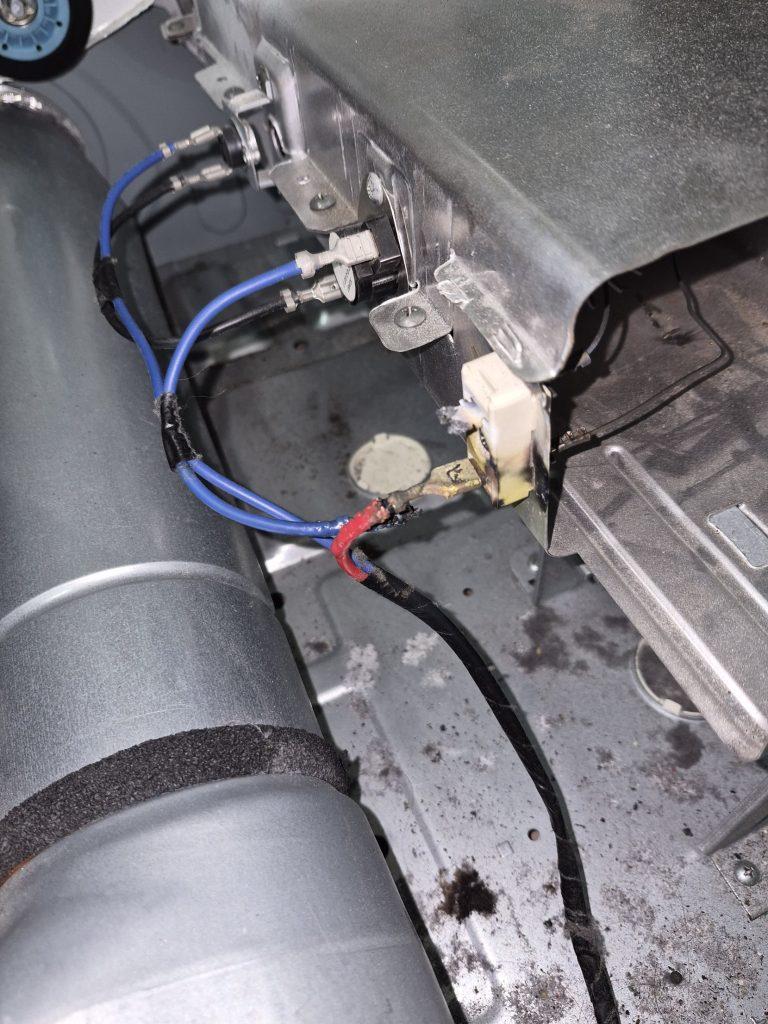 Burnt wire and melted terminal connector at the heater of a Samsung dryer, Toronto