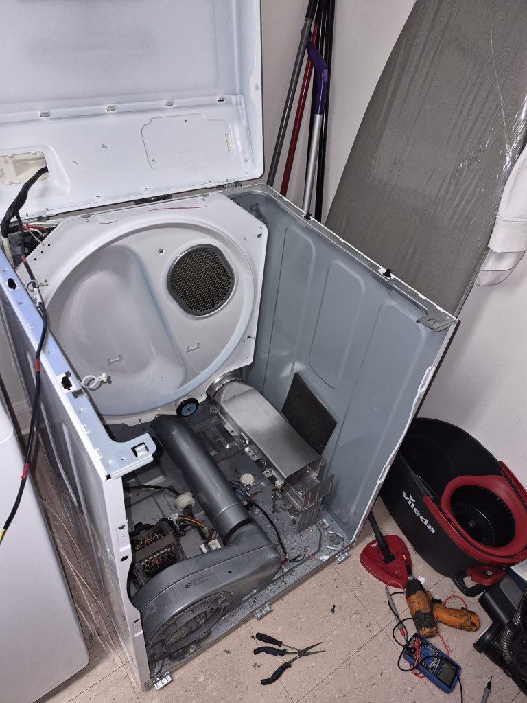 Samsung electric dryer opened up for heater and wiring repair, Toronto