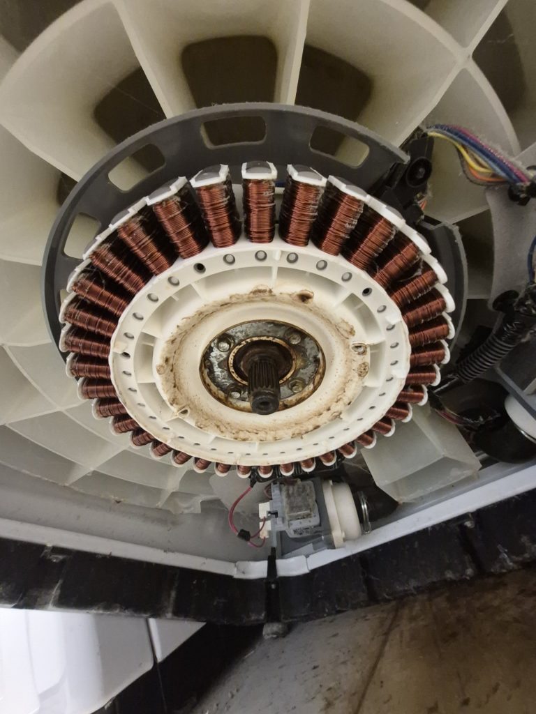 Maytag top-load washer direct drive motor stator exposed during motor replacement, North York