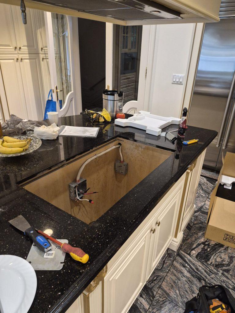 Countertop cutout with the electrical box ready for an induction cooktop installation, Richmond Hill