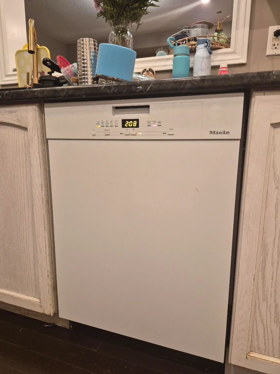 Miele built-in dishwasher back in service after a drain pump repair in Vaughan