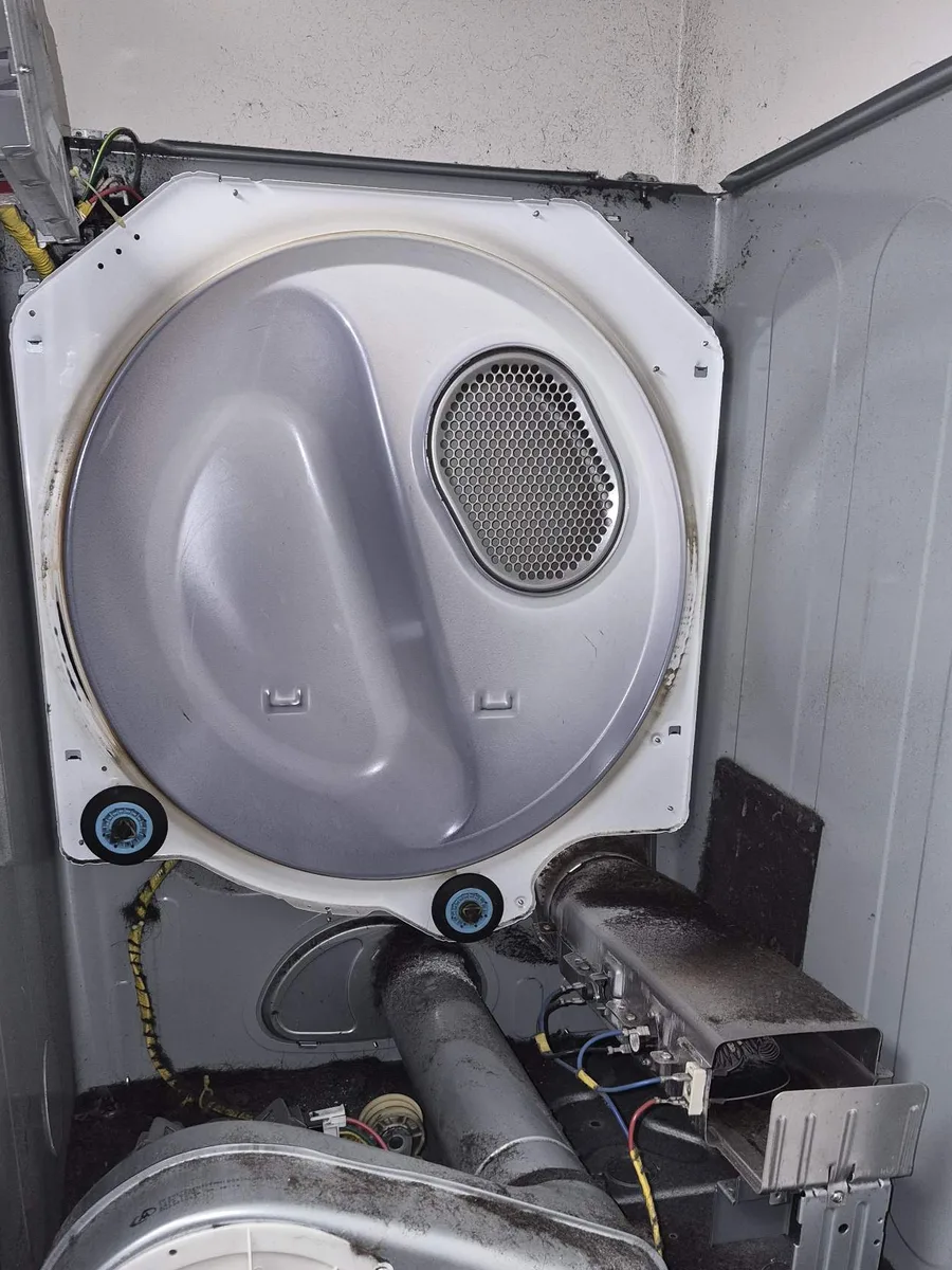 Samsung dryer opened up, full of hair and lint from a hair salon in Thornhill