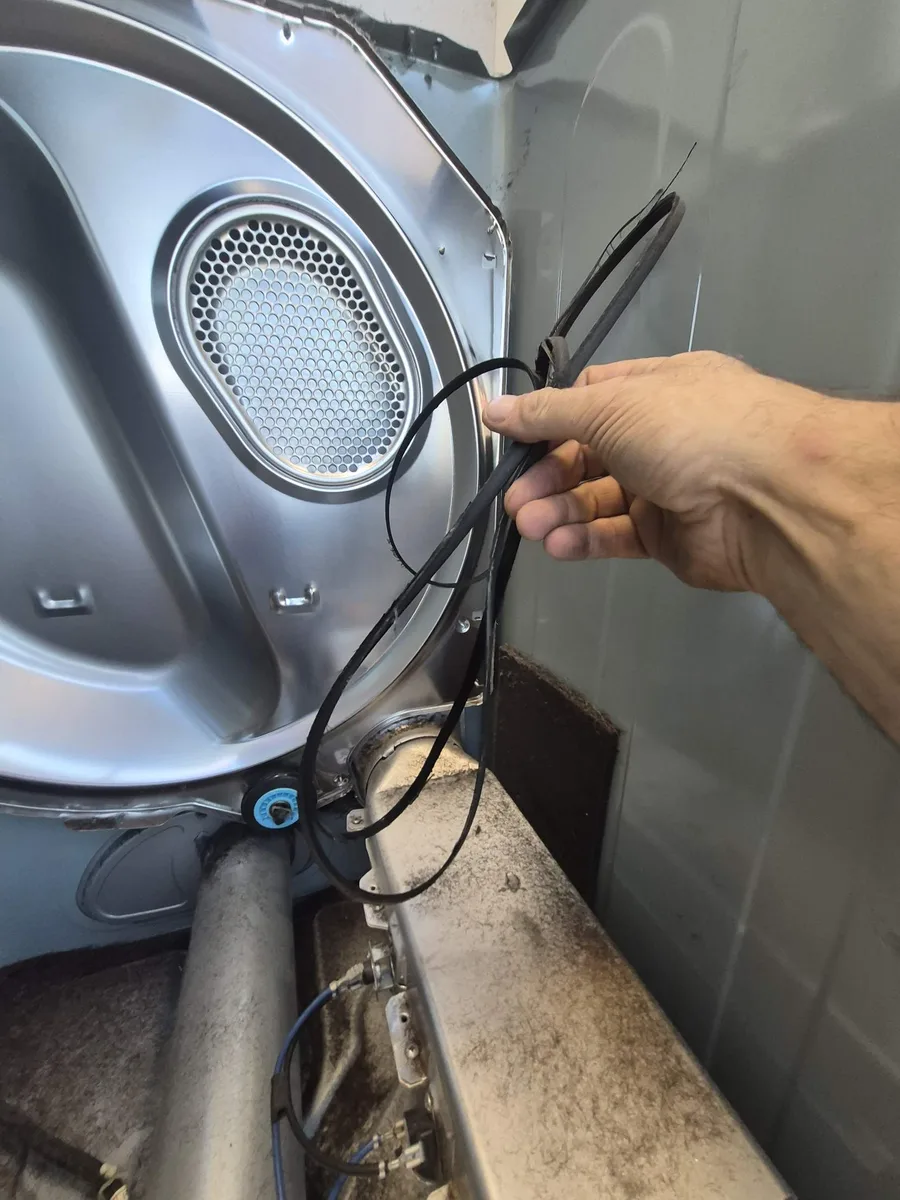 Worn, frayed drive belt removed from a Samsung dryer