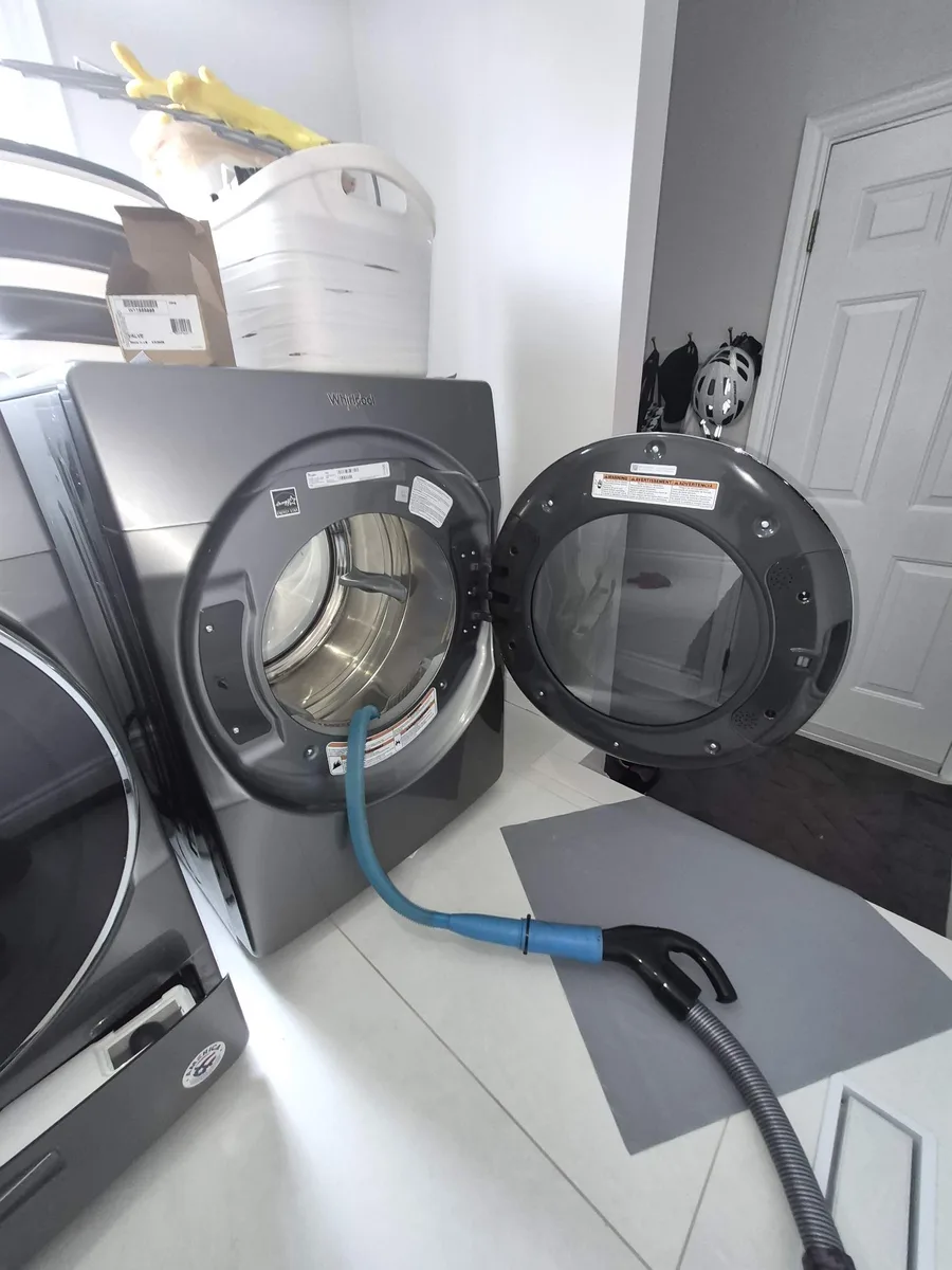 Vacuuming the lint filter housing of a Whirlpool front-load dryer