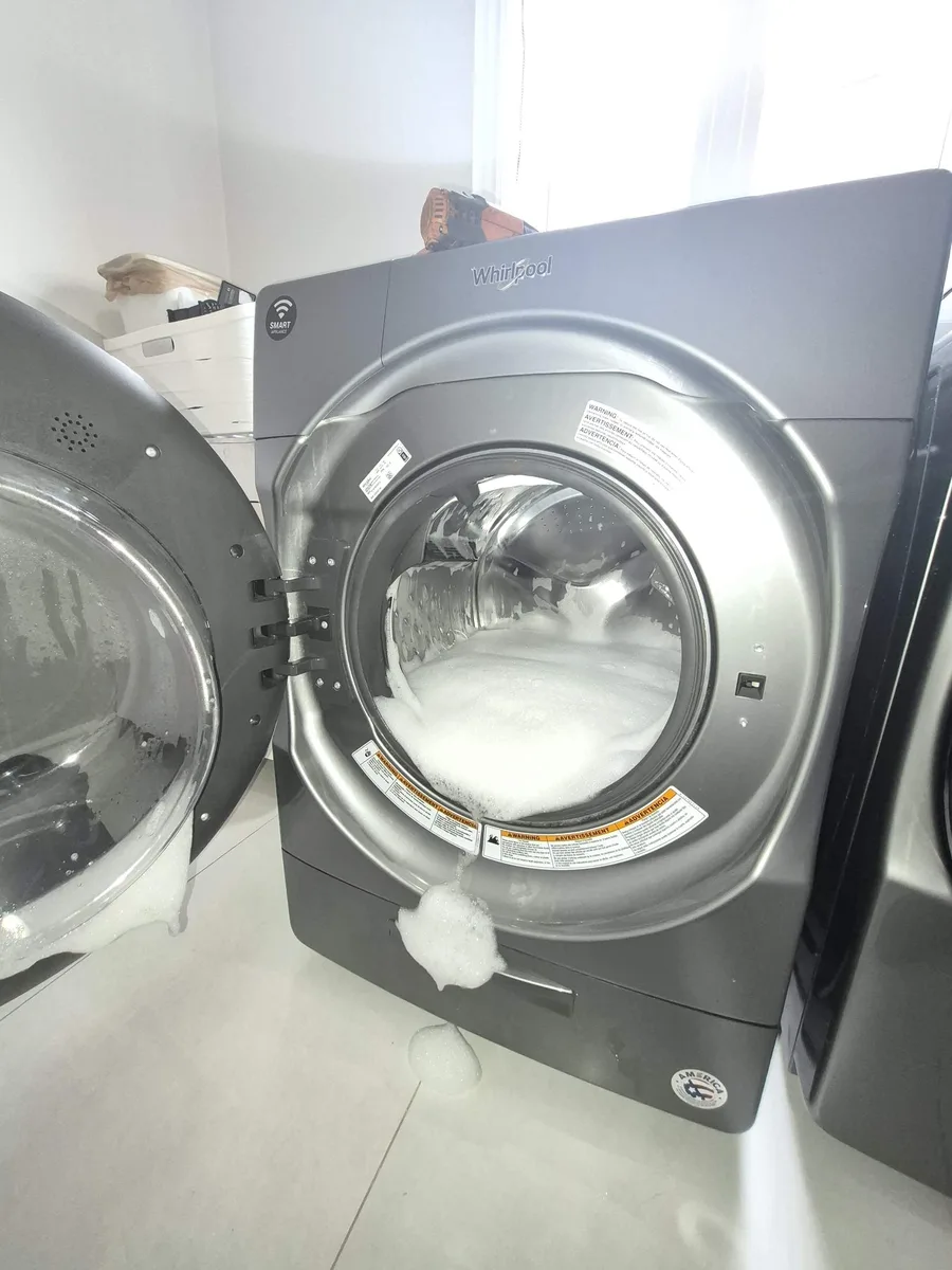 Excess suds from non-HE detergent inside a Whirlpool front-load washer